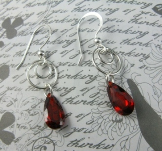 Swirly Drops in Red-Cubic Zirconia Swirly drop earrings in red