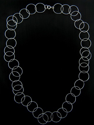 24" Sterling Silver Large Circle Diamond Cut Necklace